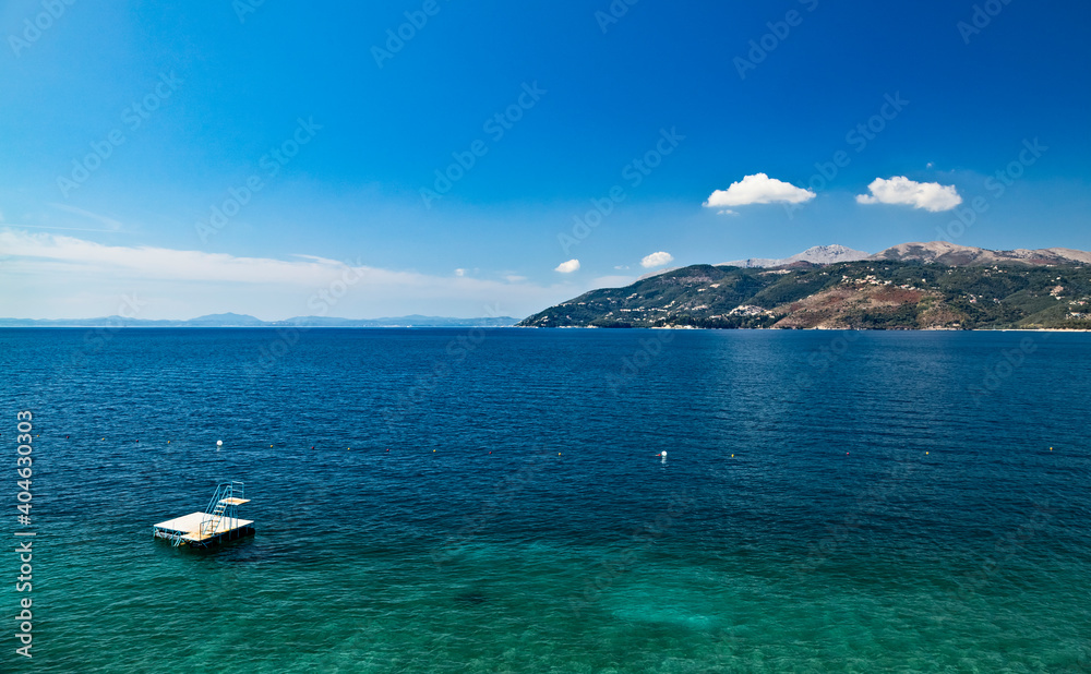 View from Albanian coast to Corfu island, Greece. Beautiful Ionian sea landscape.