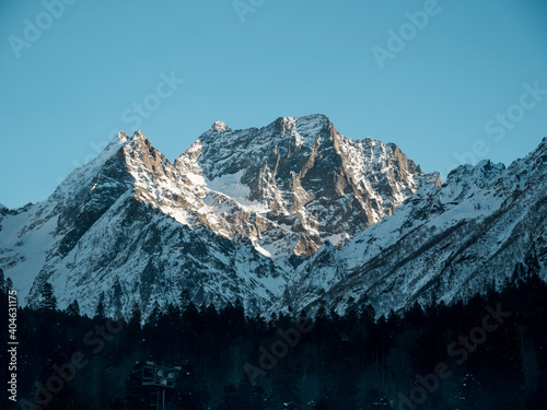 Caucasian Dombay-Ulgen mountain in the sunset light