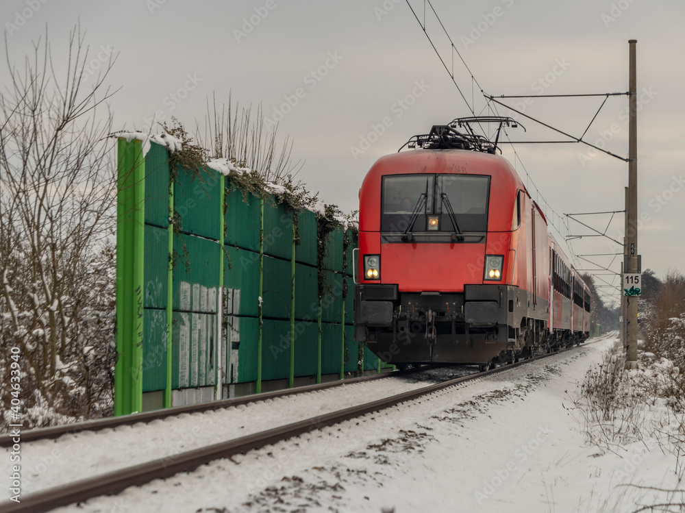 Train from Austria to Czech republic near Ceske Budejovice city in snowy day Train from Austria to Czech republic near Ceske Budejovice city in snowy day