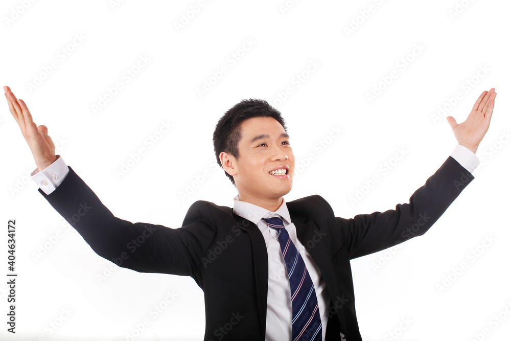 Businessman excited about his success in front of white background Businessman excited about his success in front of white background