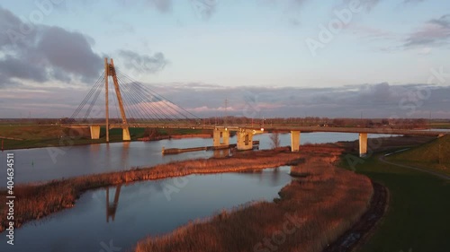 Overhead drone view on the Eilandbrug over the river Ijssel with the N50 highway. The bridge is located near Kampen in Overijssel, The Netherlands. photo