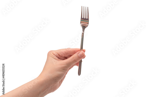 Fork in woman hand isolated on white.