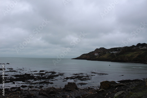 Howth, Ireland countryside cliff view of the ocean in gloomy weather © Maddie
