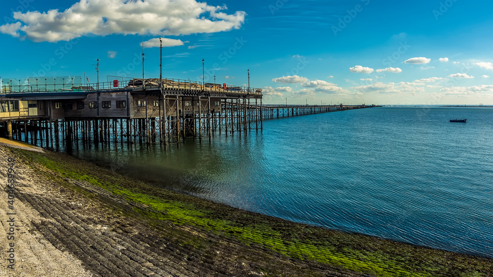 A view from the beach along the longest pleasure pier in the world at Southend-on-Sea, UK in Autumn
