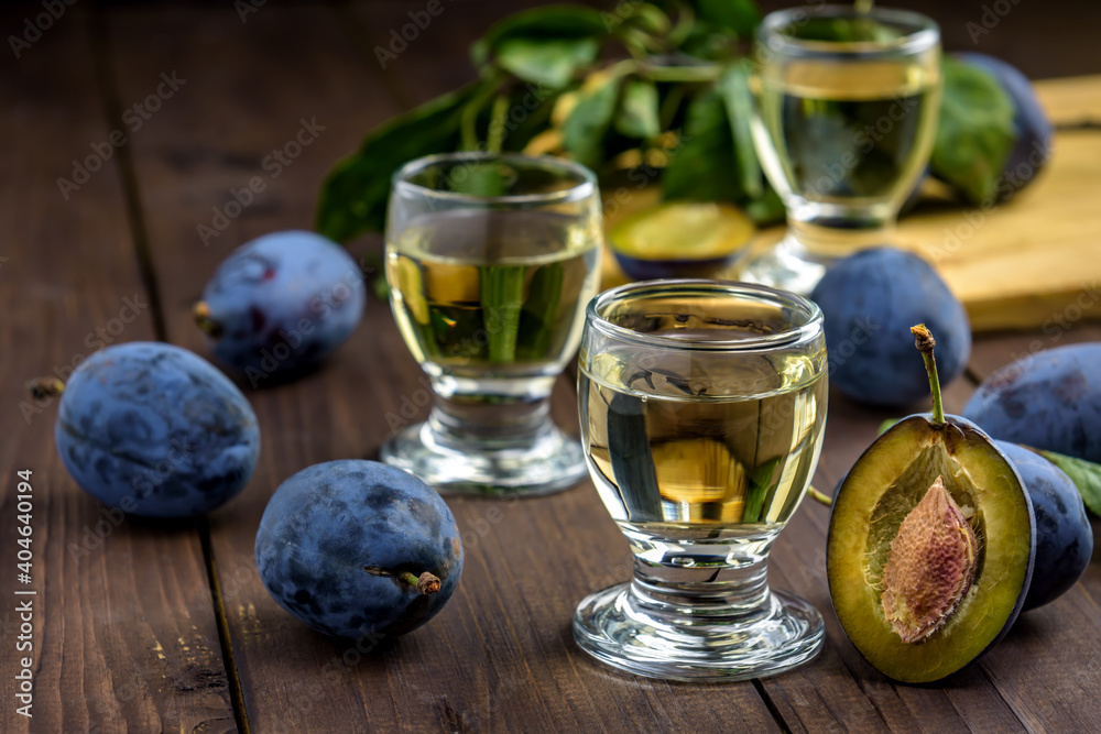 Plum brandy and fresh plums Plum brandy and fresh plums
