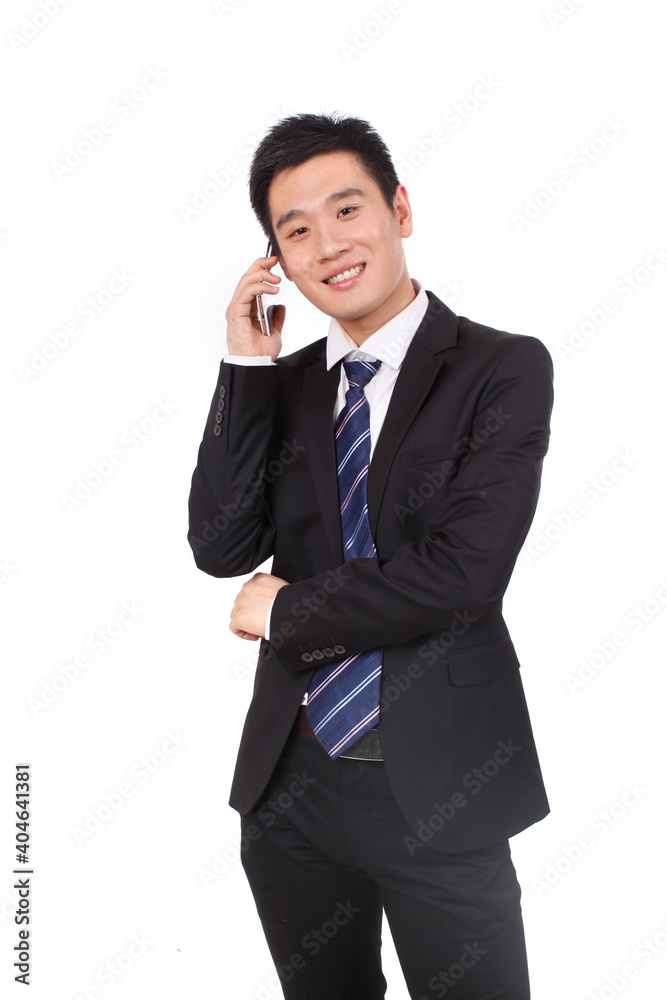 Portrait of a businessman standing with cellular phono Portrait of a businessman standing with cellular phono