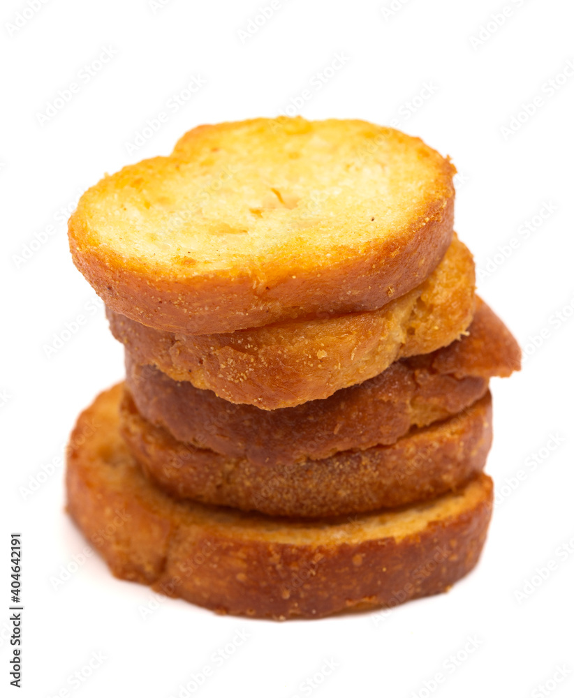Large Baguette Croutons Toasted and on a White Background Large Baguette Croutons Toasted and on a White Background