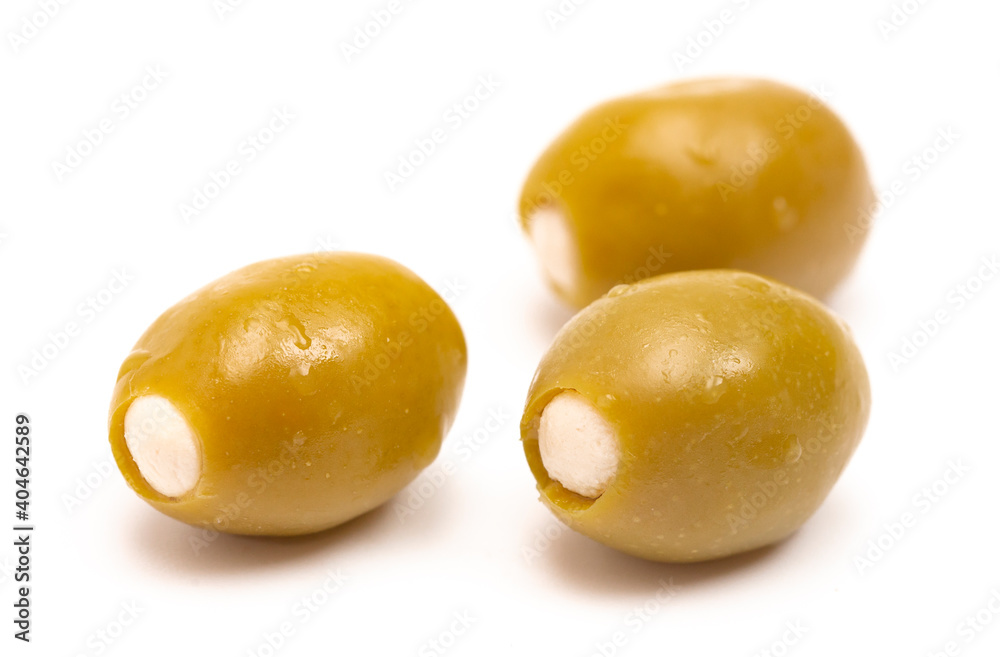 Green Olives Stuffed with Cheese on a White Background Green Olives Stuffed with Cheese on a White Background