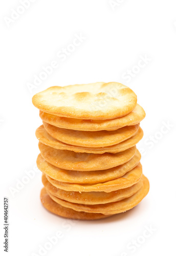Golden Baked Pita Crackers on a White Background