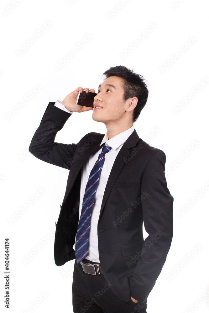 Portrait of a businessman standing with cellular phono Portrait of a businessman standing with cellular phono