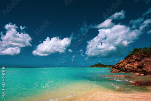 Fototapeta Naklejka Na Ścianę i Meble -  The Caribbean Sea on Antigua and Barbuda Beach.