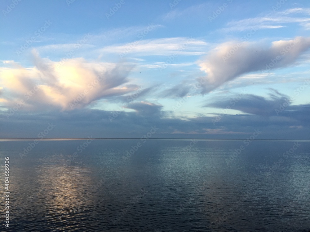 Artist pallet of wispy clouds on calm Lake Ontario