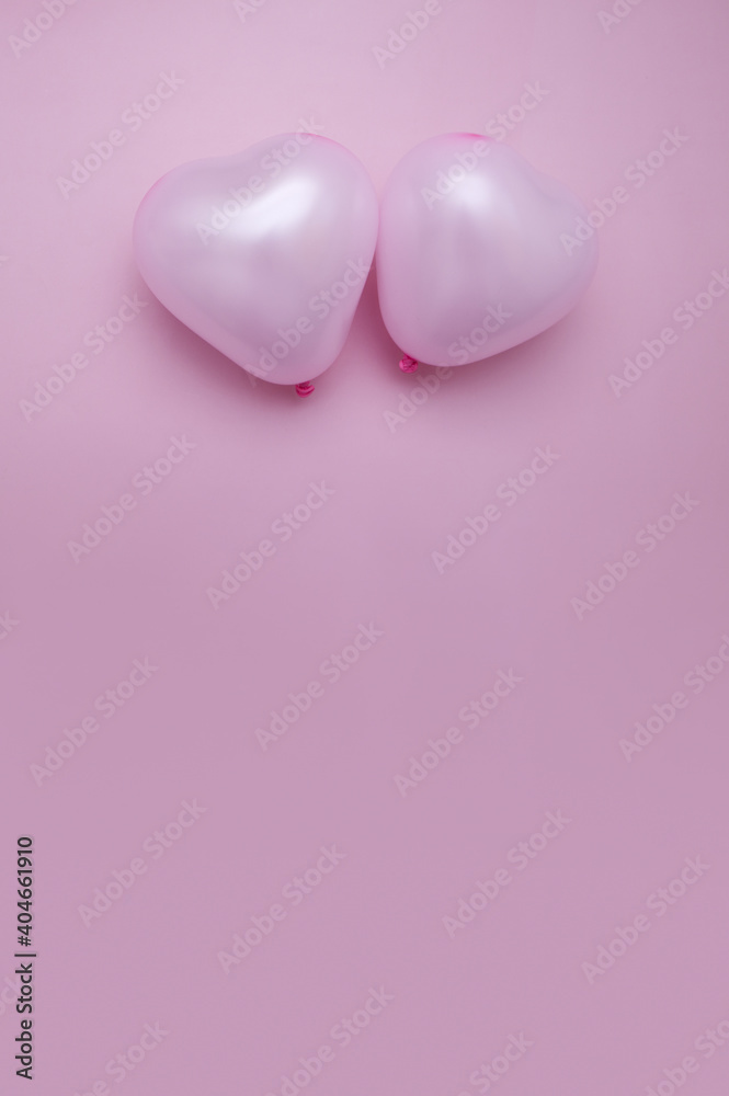 valentine's day flat lay with heart shape two balloons monochrome pink copy space