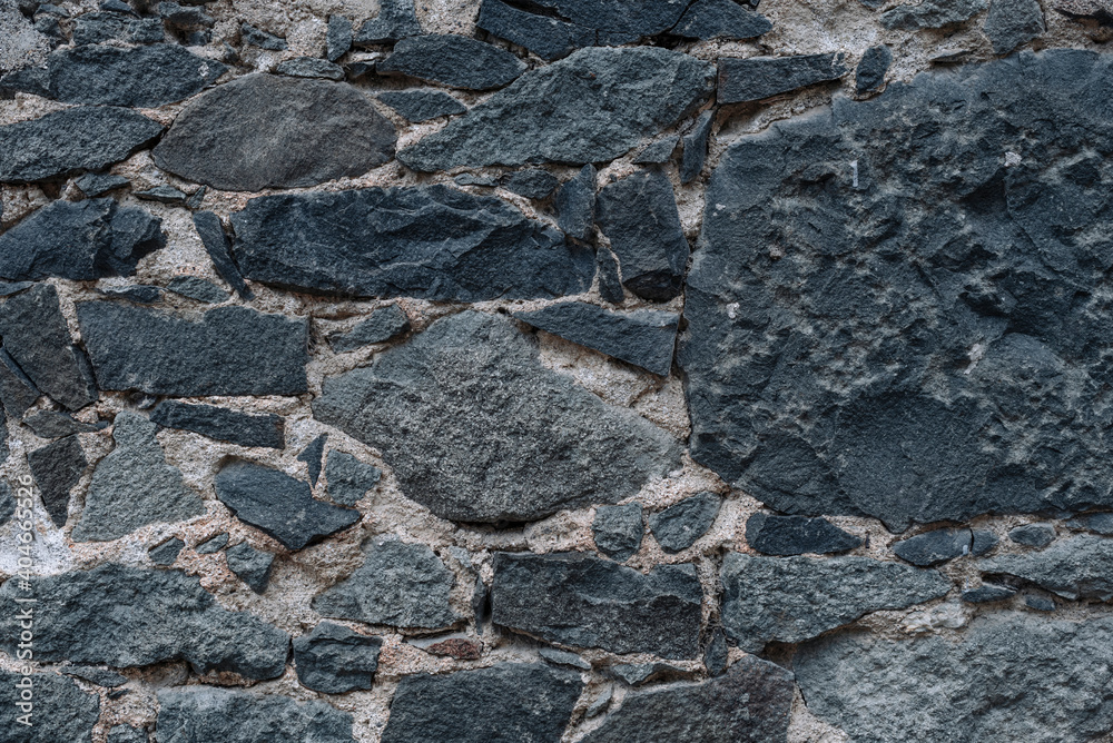 Texture of a Old castle stone wall texture background. Part of a stone wall, for background or texture