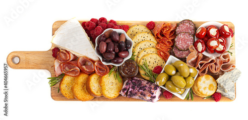 Fotografie, Obraz A Savoury Charcuterie Board Covered in Meats Olives Peppers Berries and Cheese