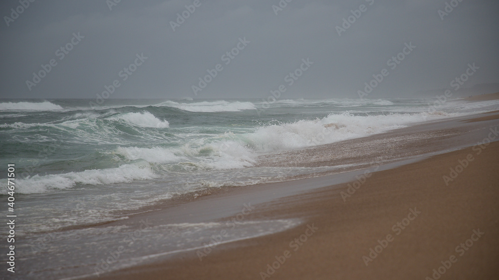 Beautiful coast of the Indian Ocean in cloudy weather. Beautiful coast of the Indian Ocean in cloudy weather.