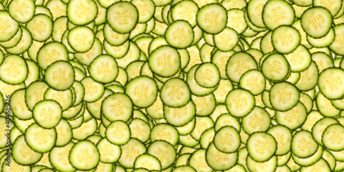 Cucumber slices covering screen background. Food concept theme