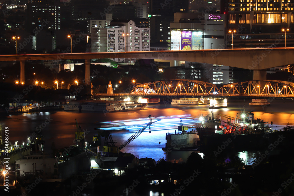 Aerial View of Condominium, Living place in Bangkok City Downtown with Night View, Night cityscape chao Phraya river in Bangkok ,Thailand.