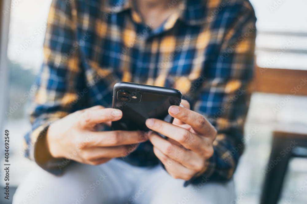 work using cell phone hand holding mobile texting message contact us.chatting,search internet information in office.technology device communication connecting work using cell phone hand holding mobile texting message contact us.chatting,search internet information in office.technology device communication connecting