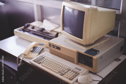 Old office and computer with obsolete technology