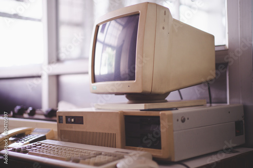 Old office and computer with obsolete technology