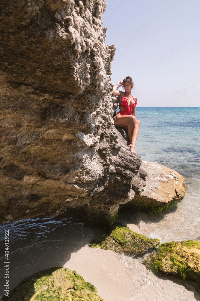Fotografie Prendendo il sole sulle rocce