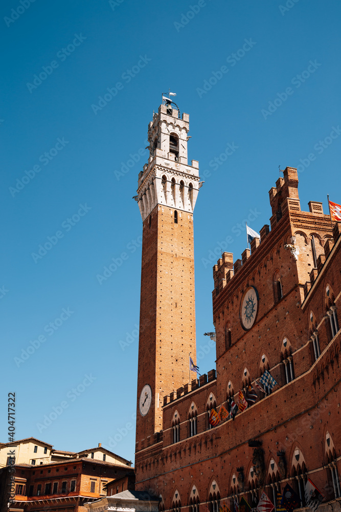 Torre del Mangia tower at Campo square in Siena, Italy