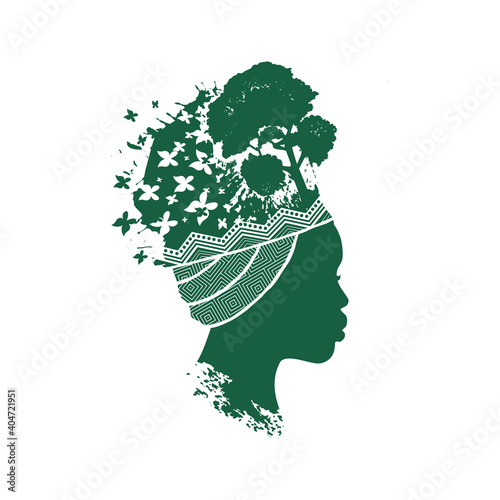 Portrait Green beautiful silhouette African woman in traditional turban with butterflies and tree