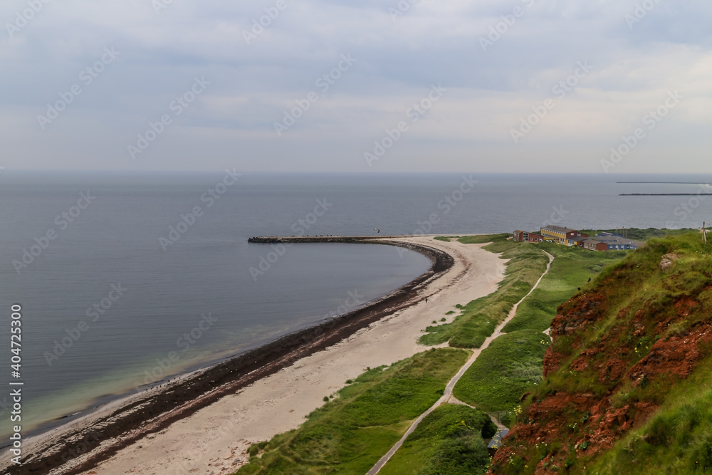 Scenery along the iconic red cliffs of Helgoland in the Waddell Sea off the coast of Germany Scenery along the iconic red cliffs of Helgoland in the Waddell Sea off the coast of Germany