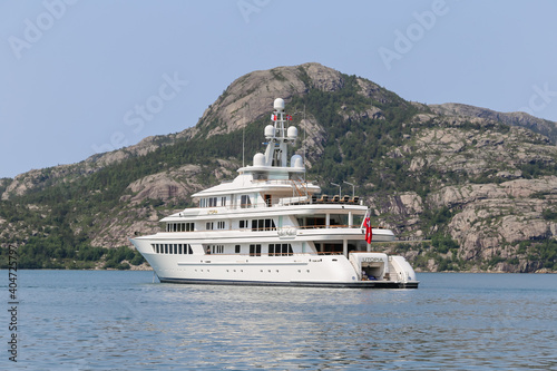 Mega yachtanchored off the shores of Gerainger in the fjords of Norway