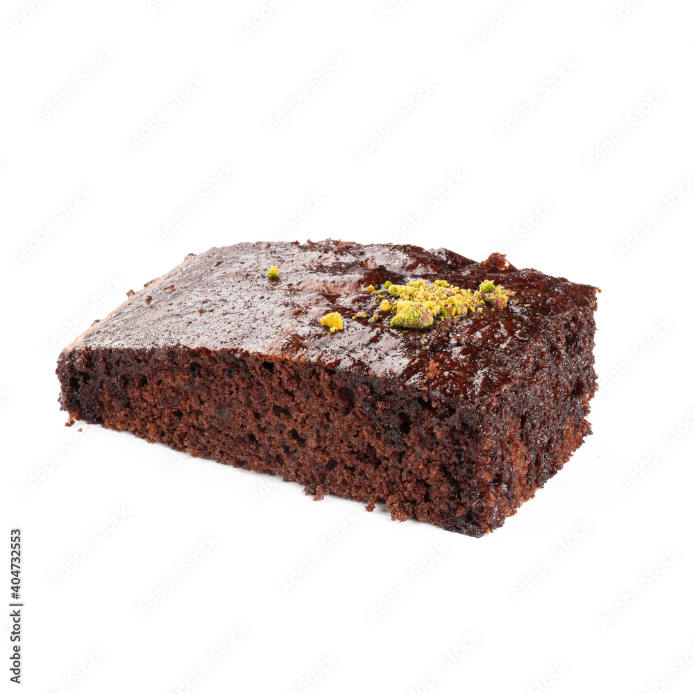Isolated chocolate casserole with pistachio on the white background Isolated chocolate casserole with pistachio on the white background