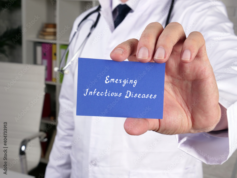 Health care concept about Emerging Infectious Diseases with inscription on the sheet. Health care concept about Emerging Infectious Diseases with inscription on the sheet.