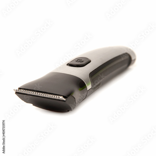Electric rechargeable shaver beard trimmer isolated with attachement on a white background