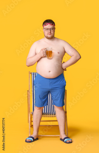 Overweight man in swimwear ...