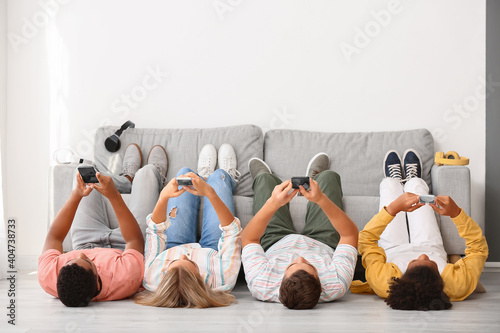 Teenagers with mobile phone...