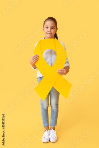 Little girl with golden rib...