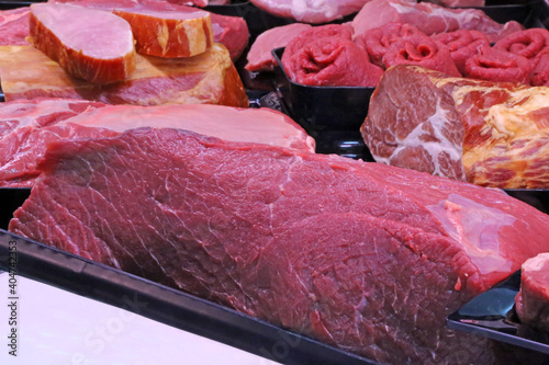 Variety of fine meat products in the butchery photo