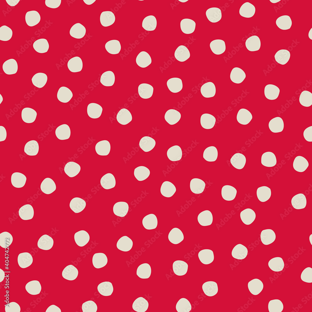 Seamless hand drawn polka-dot pattern on red background for surface design and other design projects