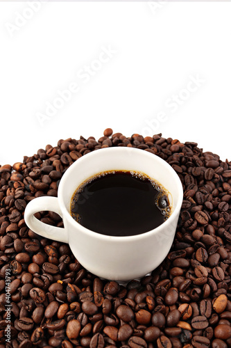 Coffee cup and coffee beans isolated on white background.