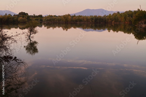 Lake in Renai park at sunset, Tuscany, Italy