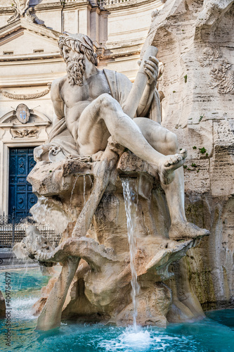 River Ganges statue part of the Four Rivers Fountain from 1651 by Gian Lorenzo Bernini in baroque style locatet in the center of Navona Square in Rome, Lazio reigon, Italy