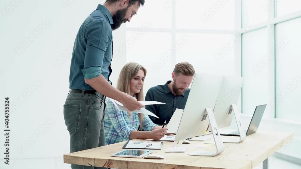 business team works with financial documents in the office. business team works with financial documents in the office.