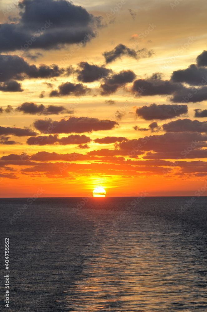 Sunset over the Atlantic ocean seen from a cruise ship
