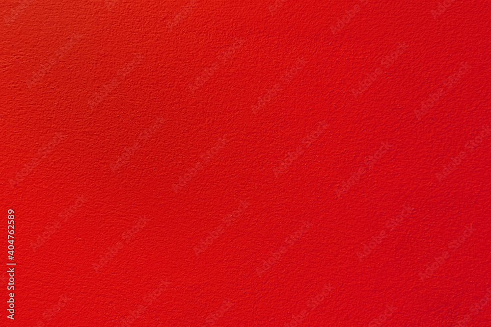 Fototapeta premium Bright red concrete wall texture for background
