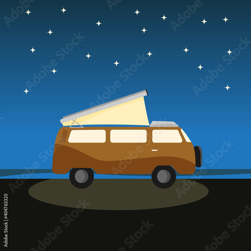 Yellow rv camp van at night outdoors. Tent for cars. Nomad lifestyle. Responsible sustainable local travel