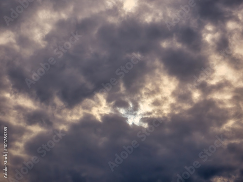 Dramatic stormy dark skies background texture.