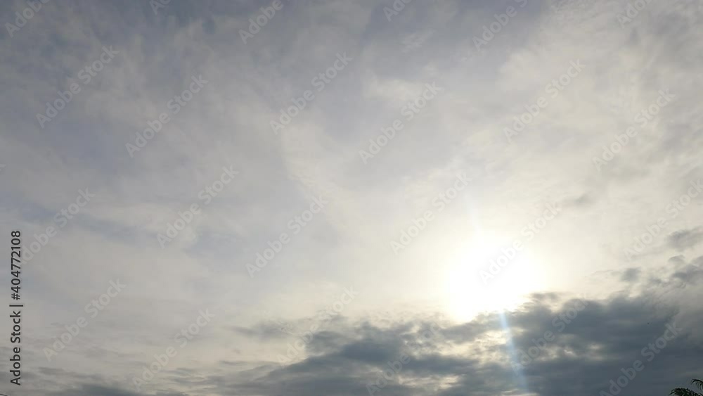 Bright sun light ray n sunbeam flare shining through dramatic golden gray cirrus cloud n beautiful sunny white cumulus cloudscape on Sunrise blue sky background, 4k cinemagraphs b-roll TimeLapse Bright sun light ray n sunbeam flare shining through dramatic golden gray cirrus cloud n beautiful sunny white cumulus cloudscape on Sunrise blue sky background, 4k cinemagraphs b-roll TimeLapse