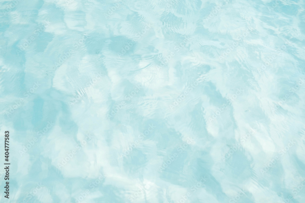 Soft blue water surface with slight ripples