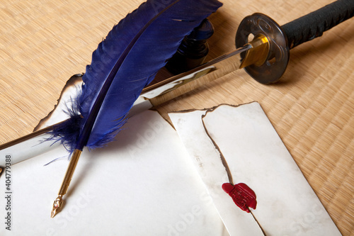 Tableau sur toile Feather sword and letter