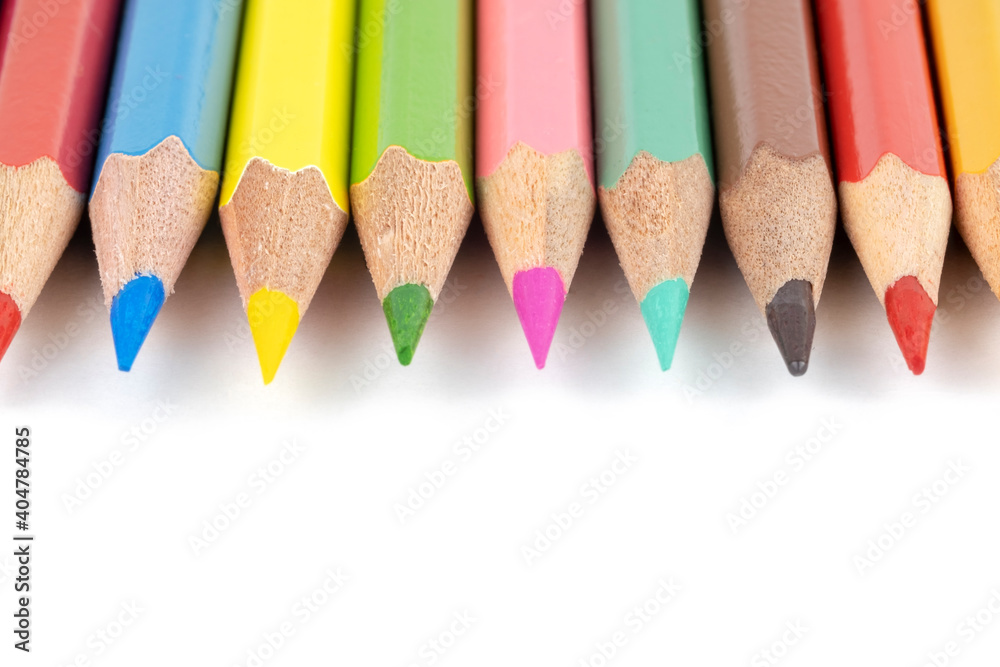 wooden bright colored pencils close up isolated on white background wooden bright colored pencils close up isolated on white background
